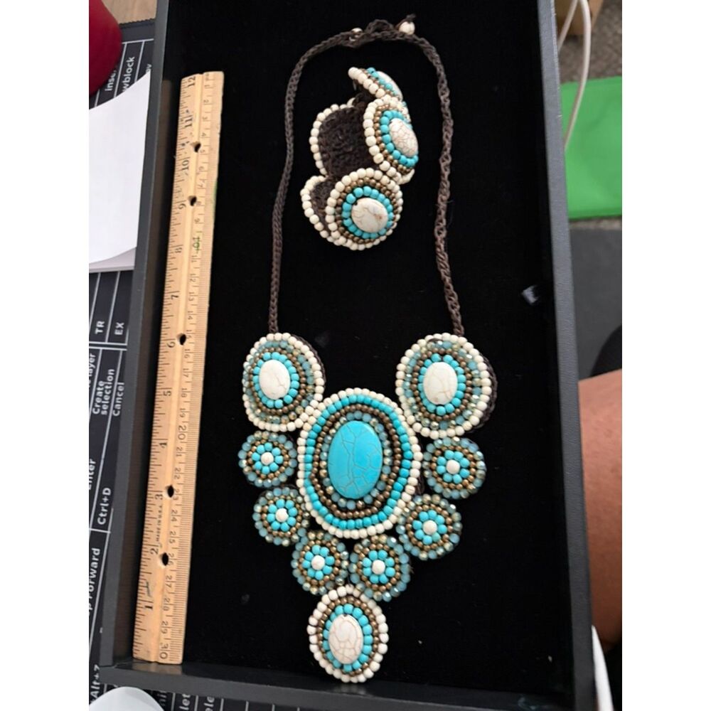 Bohemian style turquoise and white beaded bib necklace and bracelet set